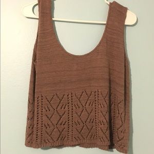 Brown knit top.