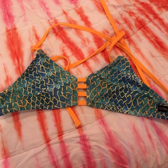 JOLYN scales Lennox top