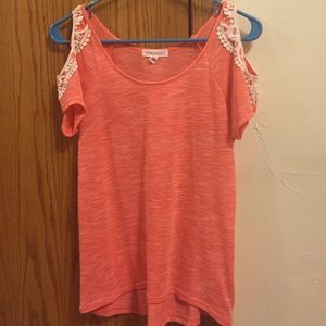 Coral open sleeve top.