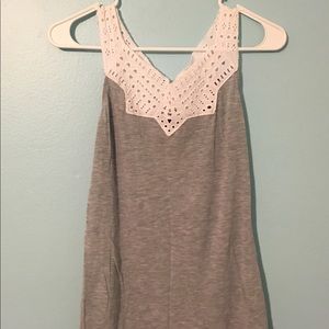 Grey embroidered top.