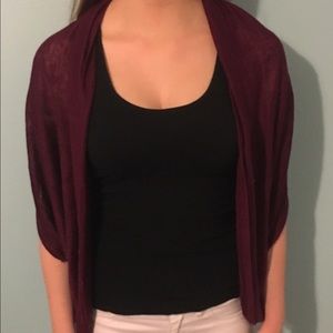 Maroon short sleeve cardigan.