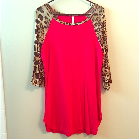 Red shirt with cheetah sleeves