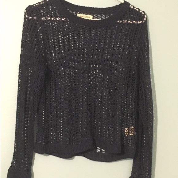 Blue knit sweater.