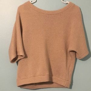 Tan sweater.