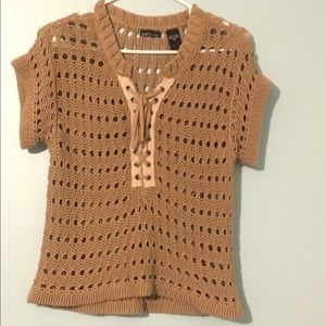 Tan lace up sweater.