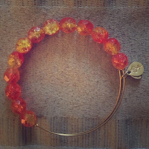 Alex & Ani bracelet.   Gold with coral beads.