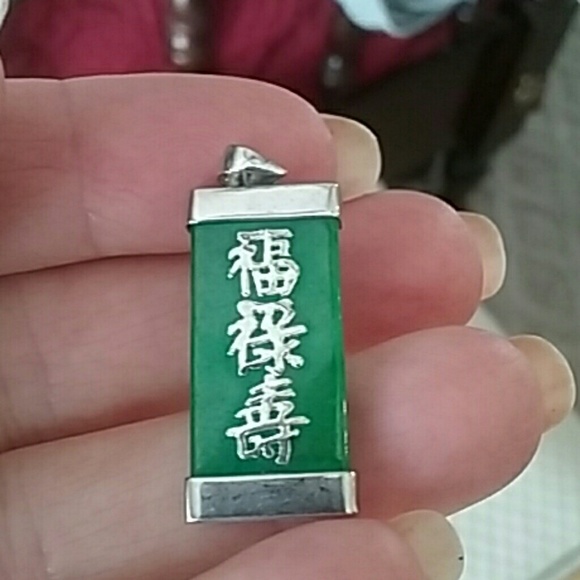 Sterling and jade Chinese style pendant.