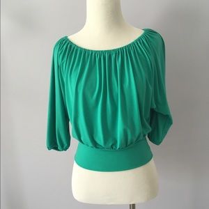 Turquoise three-quarter sleeve crop top