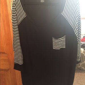 Torrid top with striped sleeves and pocket