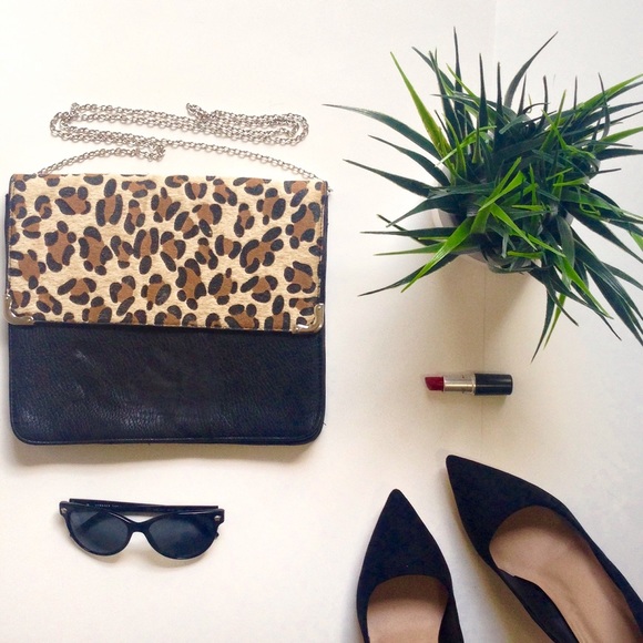 Urban Outfitters Handbags - ✨SALE✨ Animal Print Clutch/Ipad Case