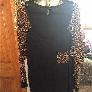 black top with leopard print sleeves & pocket