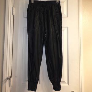 Black faux leather joggers