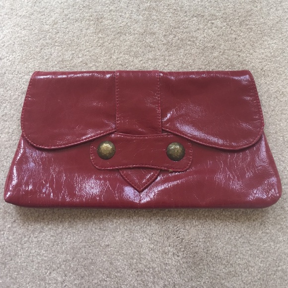 Distressed large patent leather clutch