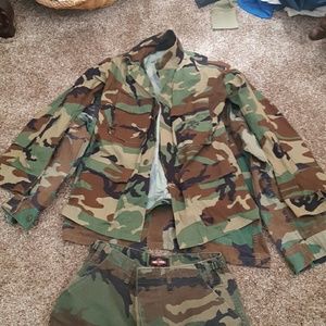 2 Camo button up coats and 2 pair of camo pants