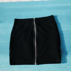 Black skirt with a zipper in the front