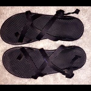 all black Chaco slip on sandals