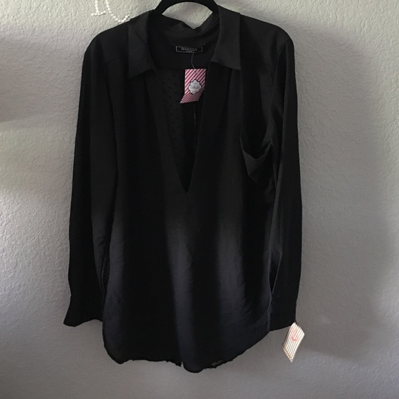 Sheer closed black blouse with open back