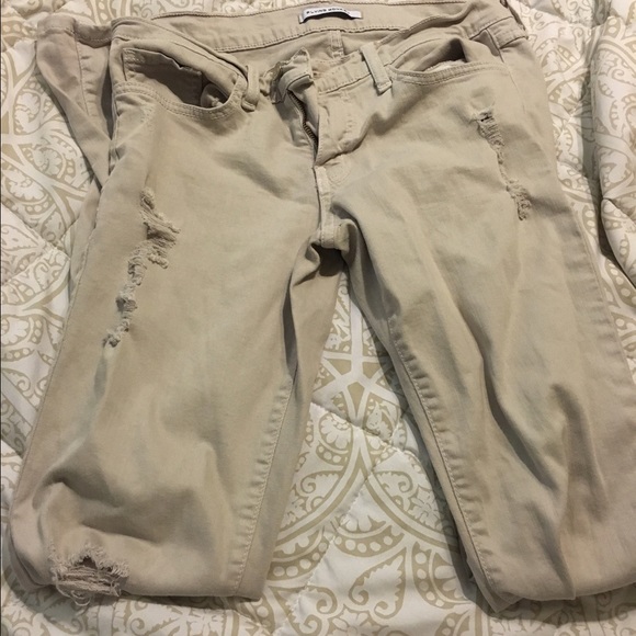 Flying monkey distressed skinny jeans .