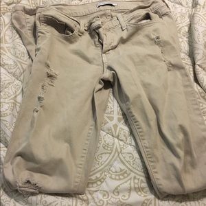 Flying monkey distressed skinny jeans .