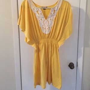 Yellow dress with lace details
