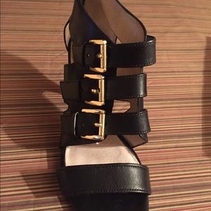 Michael kors black gold gladiator sandles. VGUC