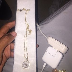 2 gold chains . With piece . Both real gold