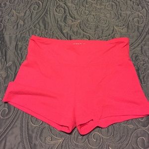 Neon coral athletic shorts
