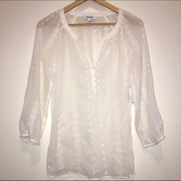 Sheer white, top with 3/4 length sleeves.