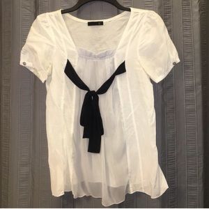 White and light grey top