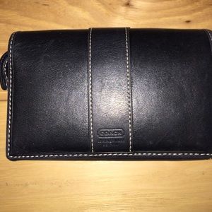 Black leather coach wallet.