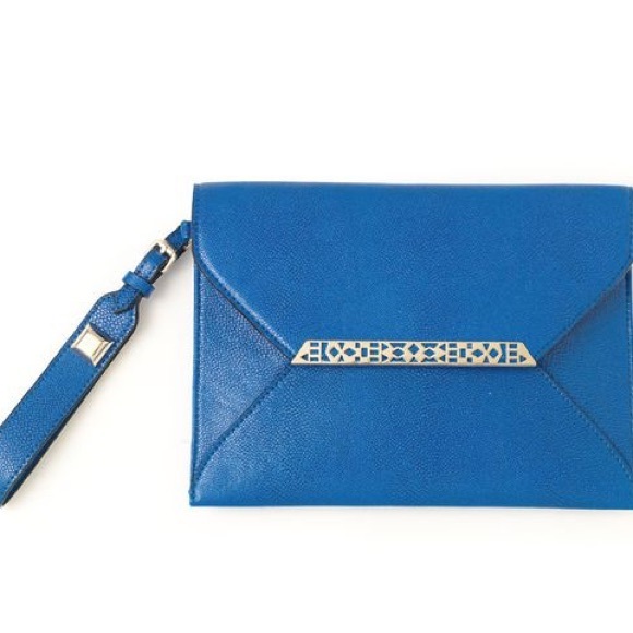 Brand new cobalt blue Stella & Dot clutch