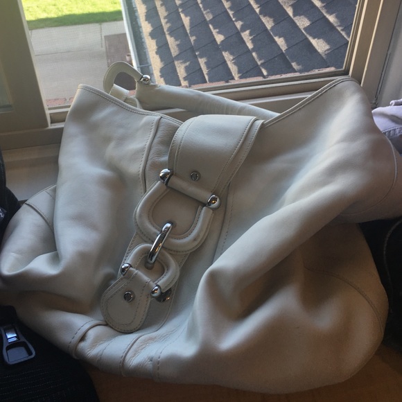 Large cream Burberry handbag.