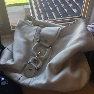 Large cream Burberry handbag.