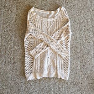 Quarter sleeve open knit sweater. Fits like small.