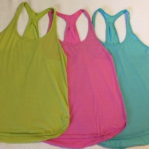 Three Lululemon 105 singlets - size 6