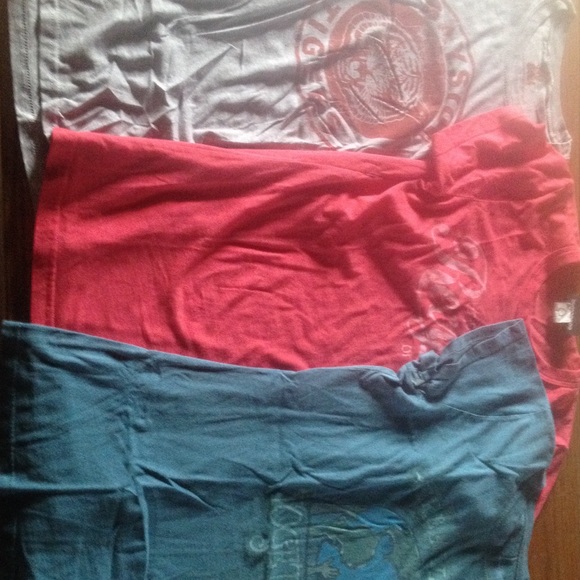 Various colored printed round neck t-shirts.