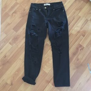 "destroyed" ripped jeans