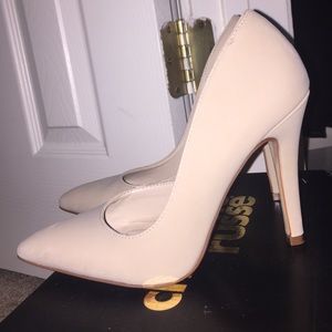 Nude pointed toe heels