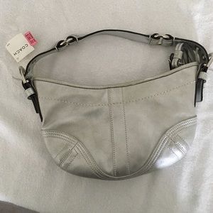 Coach silver bag.