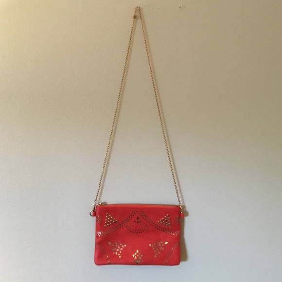 Orange purse with gold chain