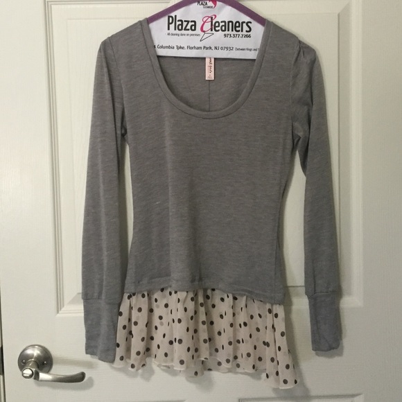 Top with ruffled sheer bottom.