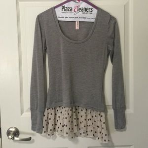 Top with ruffled sheer bottom.