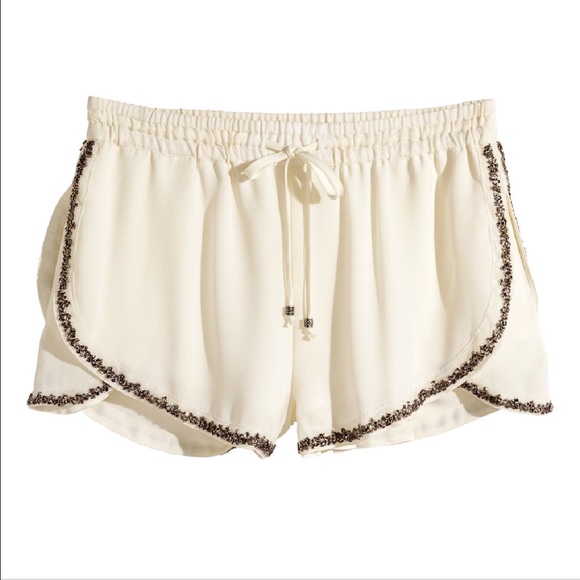 H&M ivory shorts with embellished hem