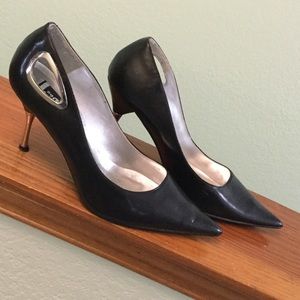 Sexy black heels, chrome accents. Size 9.5