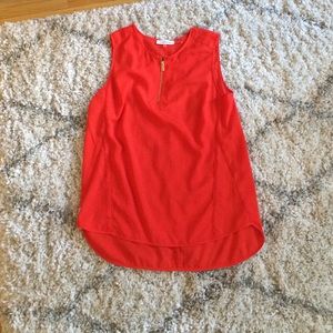 Orange sleeveless blouse