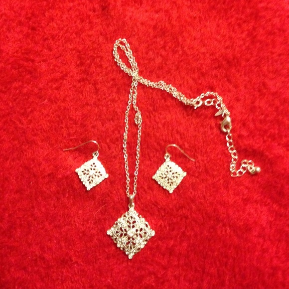 Avon Jewelry - Silver necklace/earring set