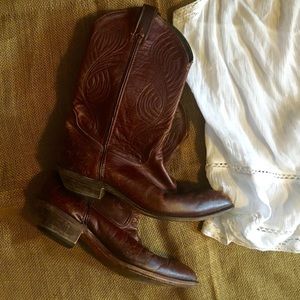Vintage worn in brown cowboy boots.
