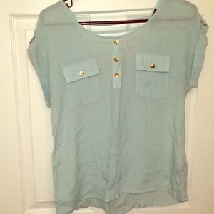 Loose top with gold buttons
