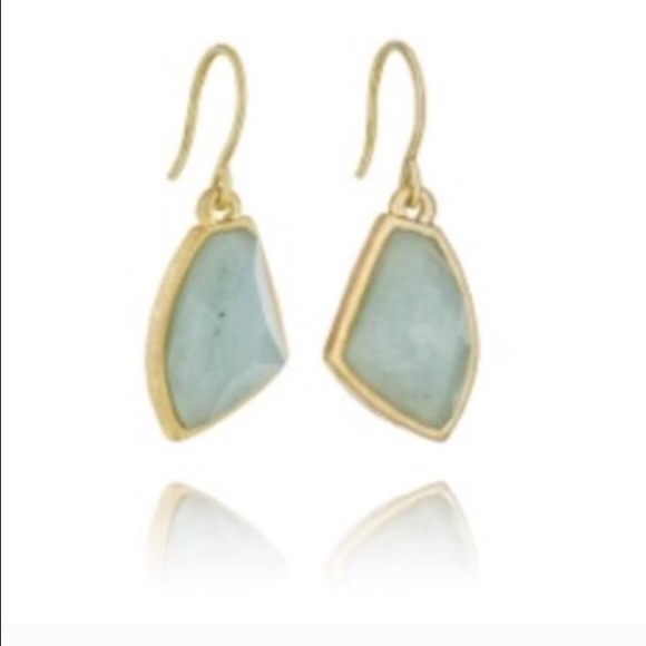 14k gold earrings with light green stone