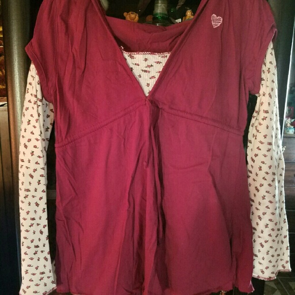 Women's long sleeved l.e.i hooded shirt.